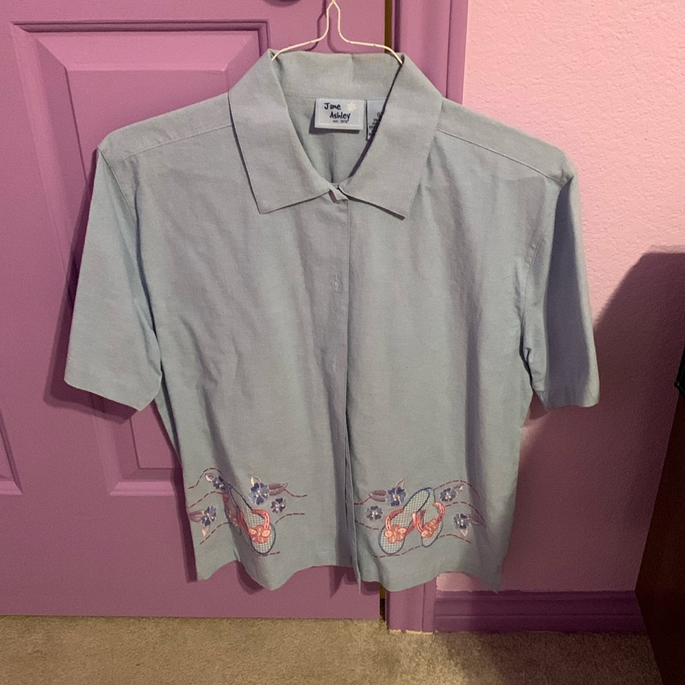 Light blue button-down top